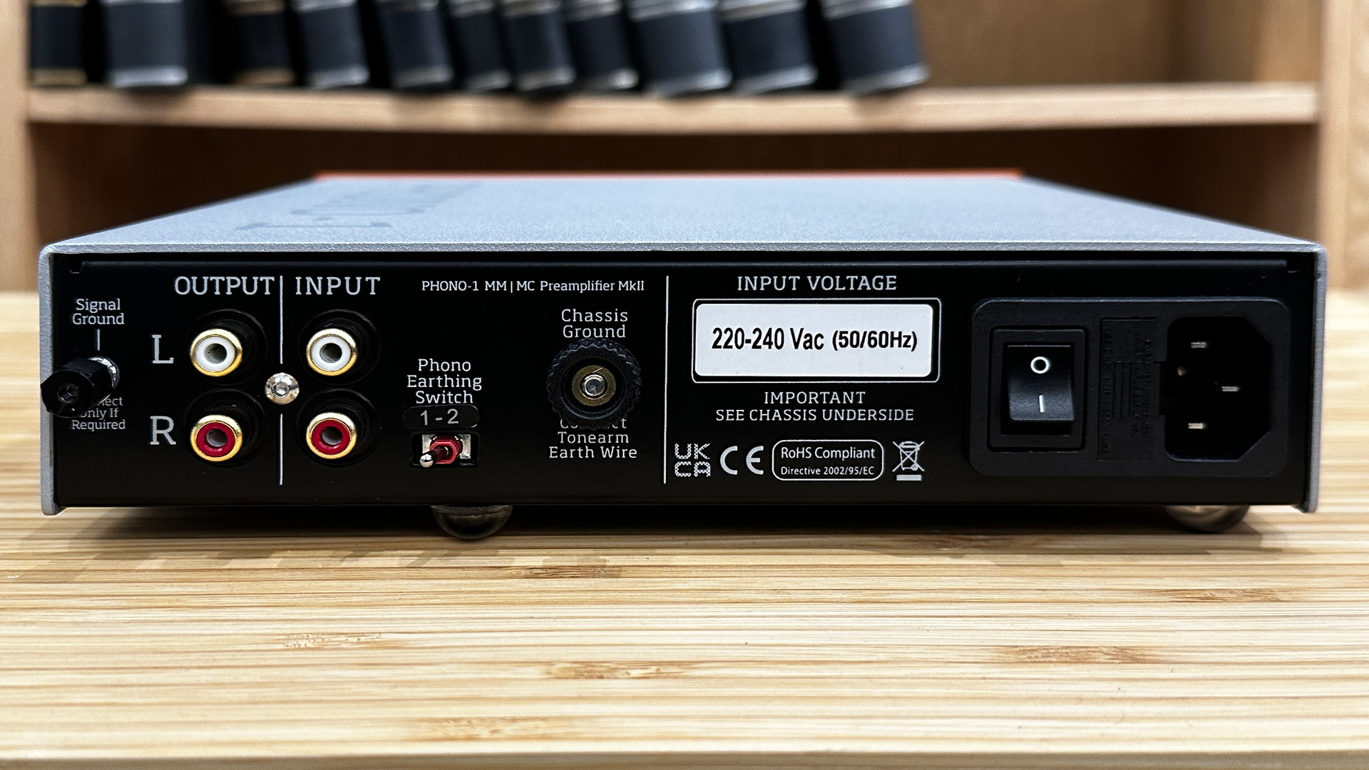 Vertere Phono-1 LX phono stage on wooden hi-fi rack, rear of unit showing connections