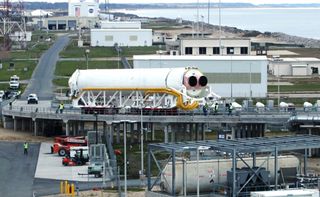 Antares Rocket First Stage Ascends to the Pad