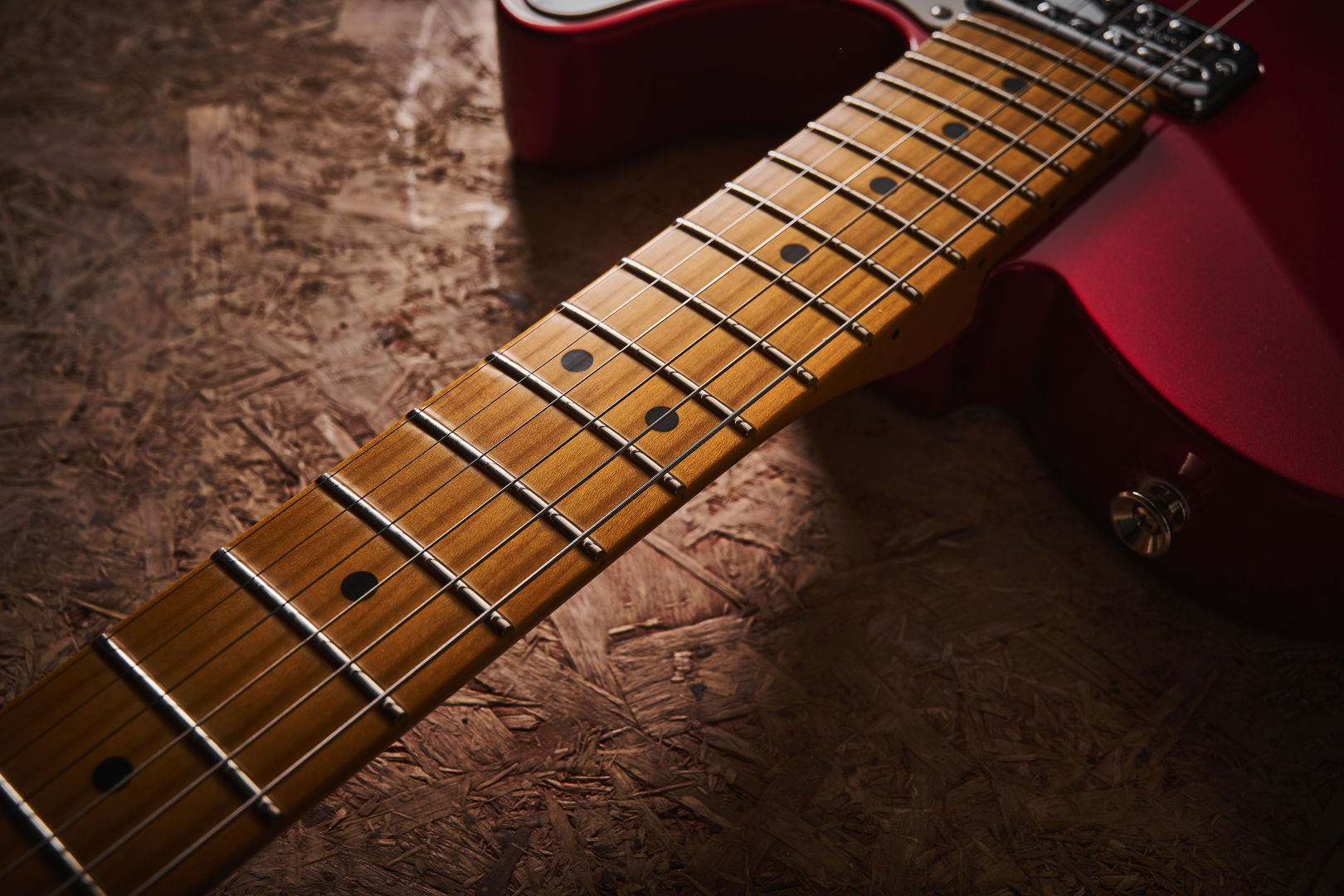 The maple fretboard of the Fender 75th Anniversary American Professional Classic Cabronita Telecaster electric guitar