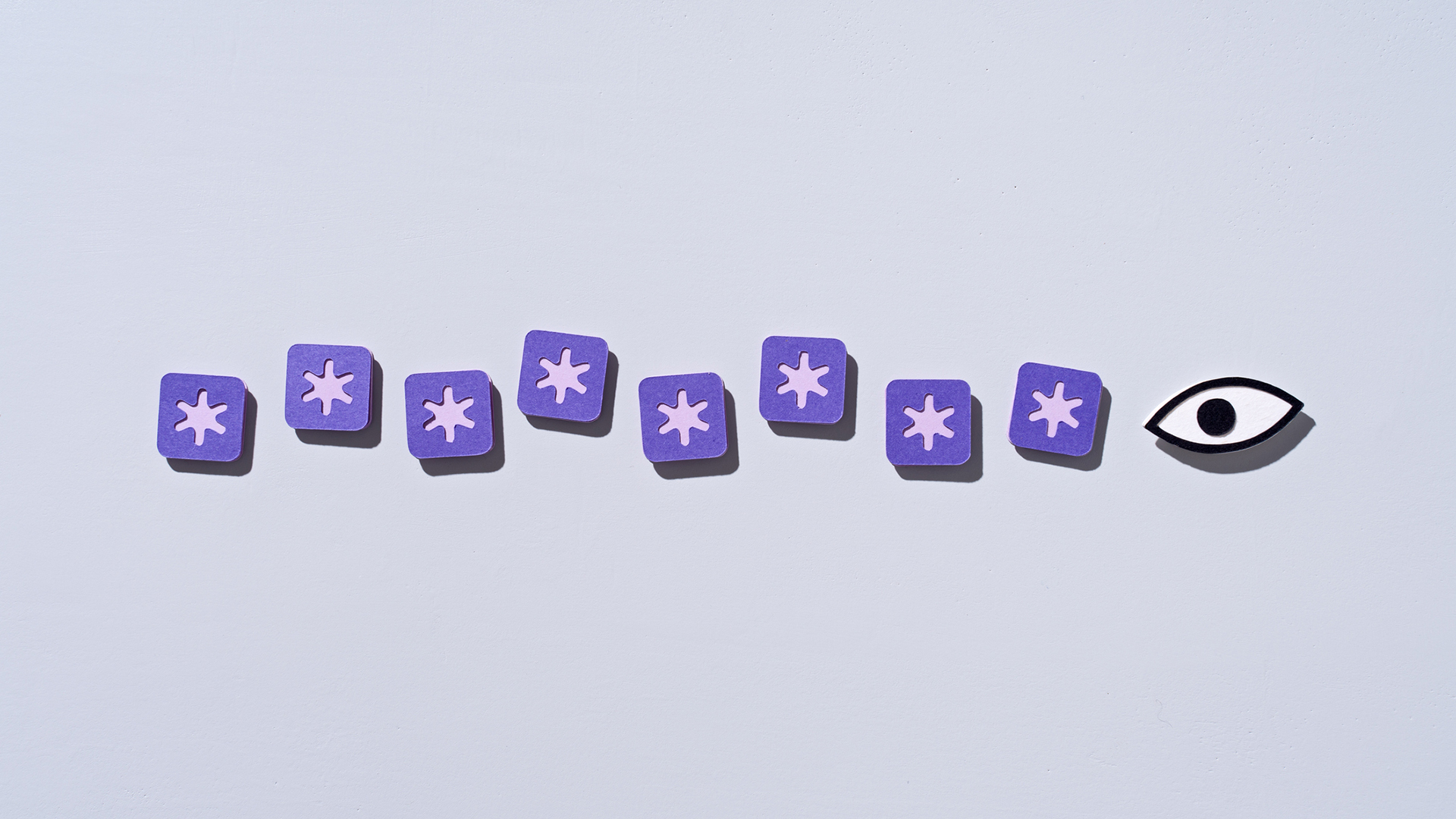 An illustration of eight purple asterisks on a grey background to represent a password, with an eye to the right looking at the asterisks.