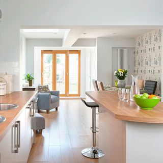 kitchen with white walls and wooden worktops