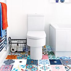white bathroom with pattern tiles