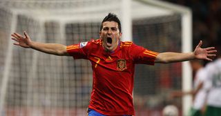 David Villa of Spain celebrates scoring the opening goal during the 2010 FIFA World Cup South Africa Round of Sixteen match between Spain and Portugal at Green Point Stadium on June 29, 2010 in Cape Town, South Africa.