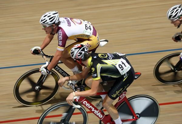 A Western Australian rider swings off the front in the under 19 men's points race