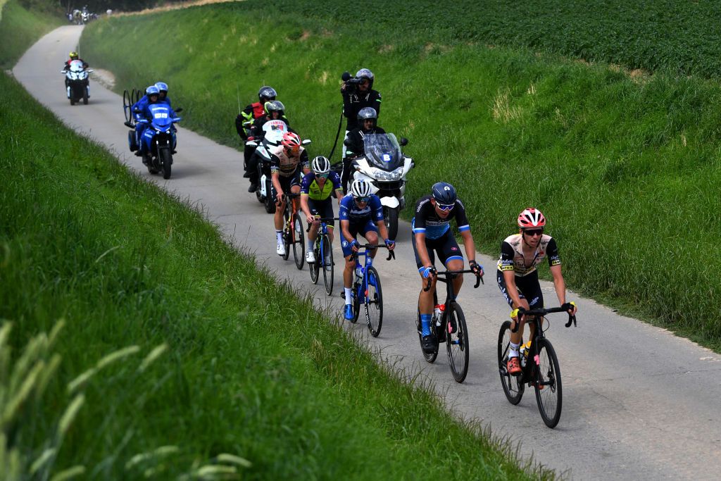 MAARKEDAL BELGIUM JUNE 15 A general view of Gianni Marchand of Belgium and Team Tarteletto Isorex and Timo De Jong of Netherlands and Volkerwessels Cycling Team Kobe Vanoverschelde of Belgium and Team Tarteletto Isorex Jorre Debaele of Belgium and Minerva Cycling Team and Luke Mudgway of New Zealand and Team Bolton Equities Black Spoke Pro Cycling Academy compete in the breakaway during the 91st Baloise Belgium Tour 2022 Stage 1 a 165km stage from Merelbeke to Merelbeke BaloiseBelgiumTour on June 15 2022 in Maarkedal Belgium Photo by Luc ClaessenGetty Images