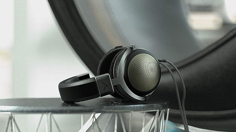 The Beyerdynamic T1 (3rd Generation) wired over-ear headphones lying on a black surface. These are our pick for best premium audiophile headphones.