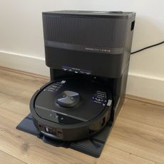 Shark PowerDetect UV Reveal 2-in-1 Vac & Mop Robot Vacuum RV3000XEUK sitting on wood-effect flooring
