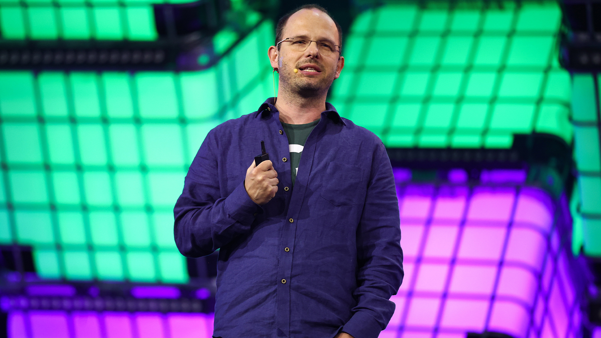 GitHub CEO Thomas Dohmke pictured speaking on stage at Web Summit Rio 2023. 