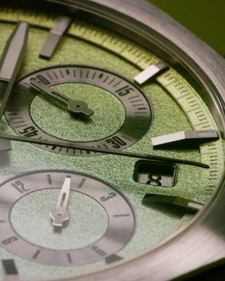 Close-up of greenish watch