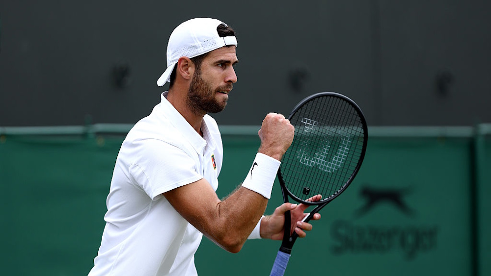 Karen Khachanov celebrating a point at Wimbledon 2025.