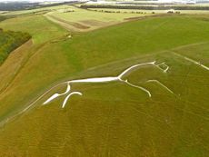 An aerial view of the prehistoric White horse carved into the hillside at Uffington,Berkshire