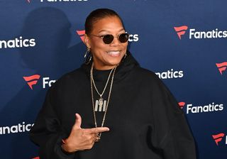 Queen Latifah poses on the red carpet