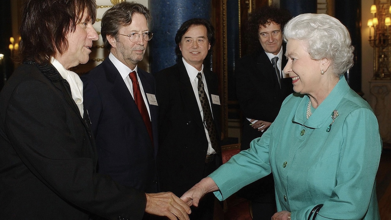 Queen Elizabeth II meets Jeff Beck, Eric Clapton, Jimmy Page and Brian May at Buckingham Palace