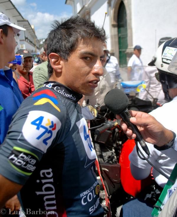 Edson Calderon (472 Colombia) gets interviewed by the media