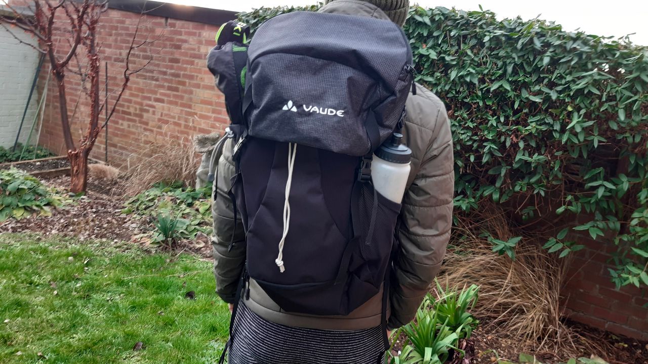 Fitness writer Lily Canter wearing the Vaude Brenta 30 hiking backpack outside