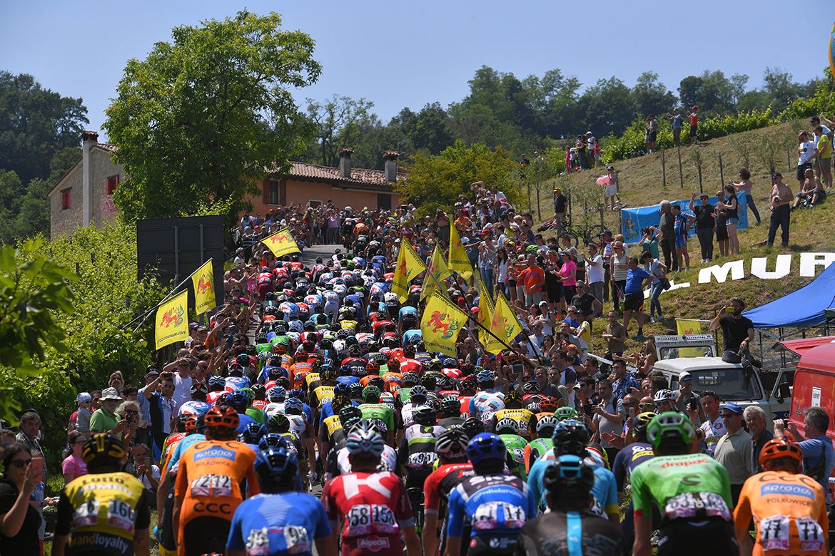 The pack works its way through tight confines on stage 20 of the Giro d'Italia.