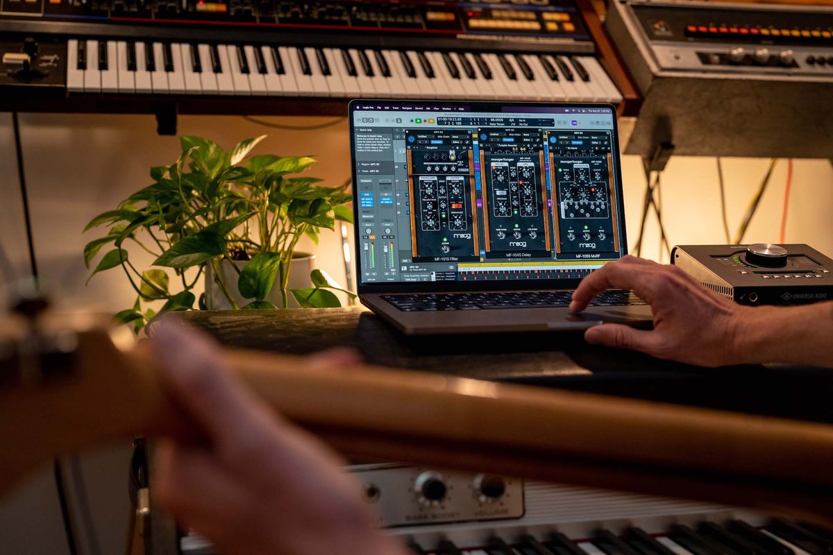 A guitarist runs Moog's Moogerfooger plugins on their computer