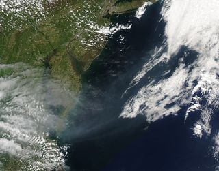 The MODIS instrument on the Aqua satellite captured this image on May 08, 2016, of smoke from the Ft. McMurray wildfire and other Canadian wildfires billowing across the Atlantic Ocean.
