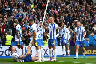 Brighton squad for 2024/25 BRIGHTON, ENGLAND - AUGUST 24: Joel Veltman of Brighton &amp; Hove Albion celebrates their winning goal by lifting the corner flag while Lewis Dunk has a cramp stretched out by Simon Adingra during the Premier League match between Brighton &amp; Hove Albion FC and Manchester United FC at Amex Stadium on August 24, 2024 in Brighton, England. (Photo by Charlotte Wilson/Offside/Offside via Getty Images)