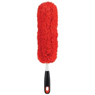 A red duster with a white, black and red handle