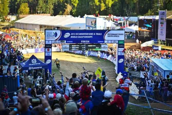 Description: http://www.gameplanmedia.co.za/mtb/2013E7FinishCrowd100.jpg The crowd at the finish of the men's downhill on the final Sunday of the UCI MTB and Trials World Championships was proof that the city of Pietermaritzburg was able to host a world class event and the benefits of such an event will be felt by the city well into the future.