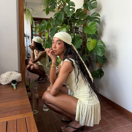 Amaka Hamelijnck with knotless braids and glowing skin