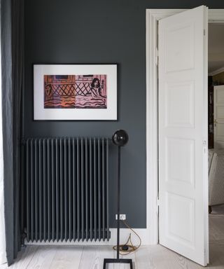 Dark grey walls and white doors and trims by Farrow & Ball