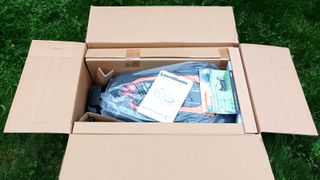 Lawnmaster L10 robot mower in box on grass