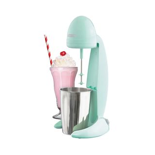 Dash Retro Milkshake Maker in mint with a stainless steel cup and ice cream inside
