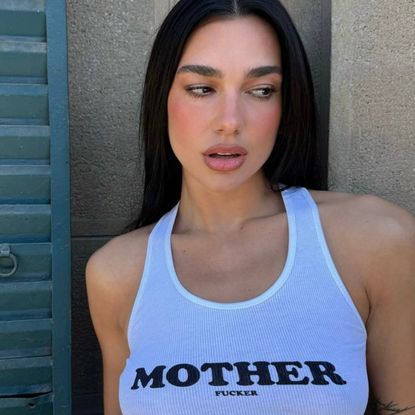 dua lipa wears a slogan tshirt from stella mccartney