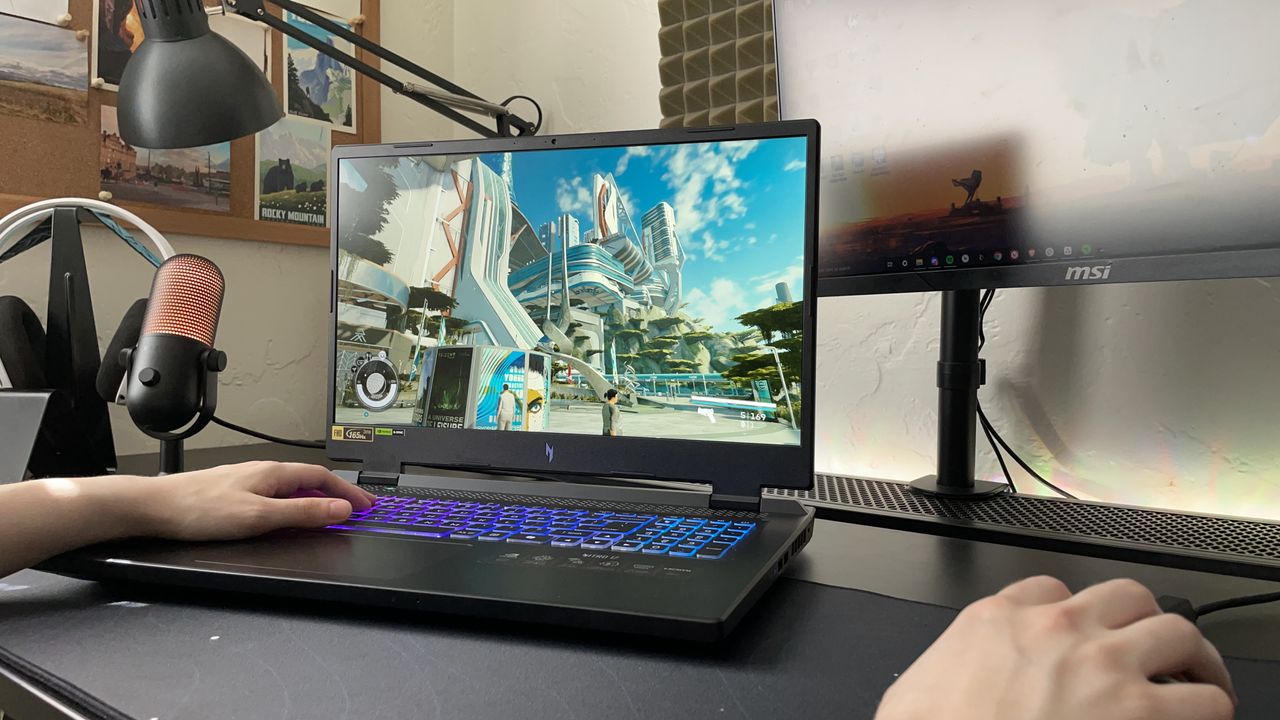 The Acer Nitro 17 on a black desk running Bethesda's Starfield game.