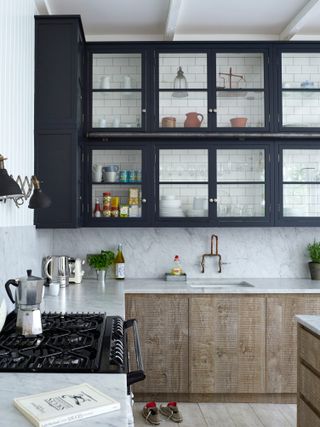 Wooden kitchen with dark blue countertops