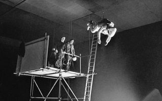 Bill Weston launching from a platform 30 feet above the concrete studio floor.