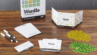 The Wordle board game's box, components, and cards