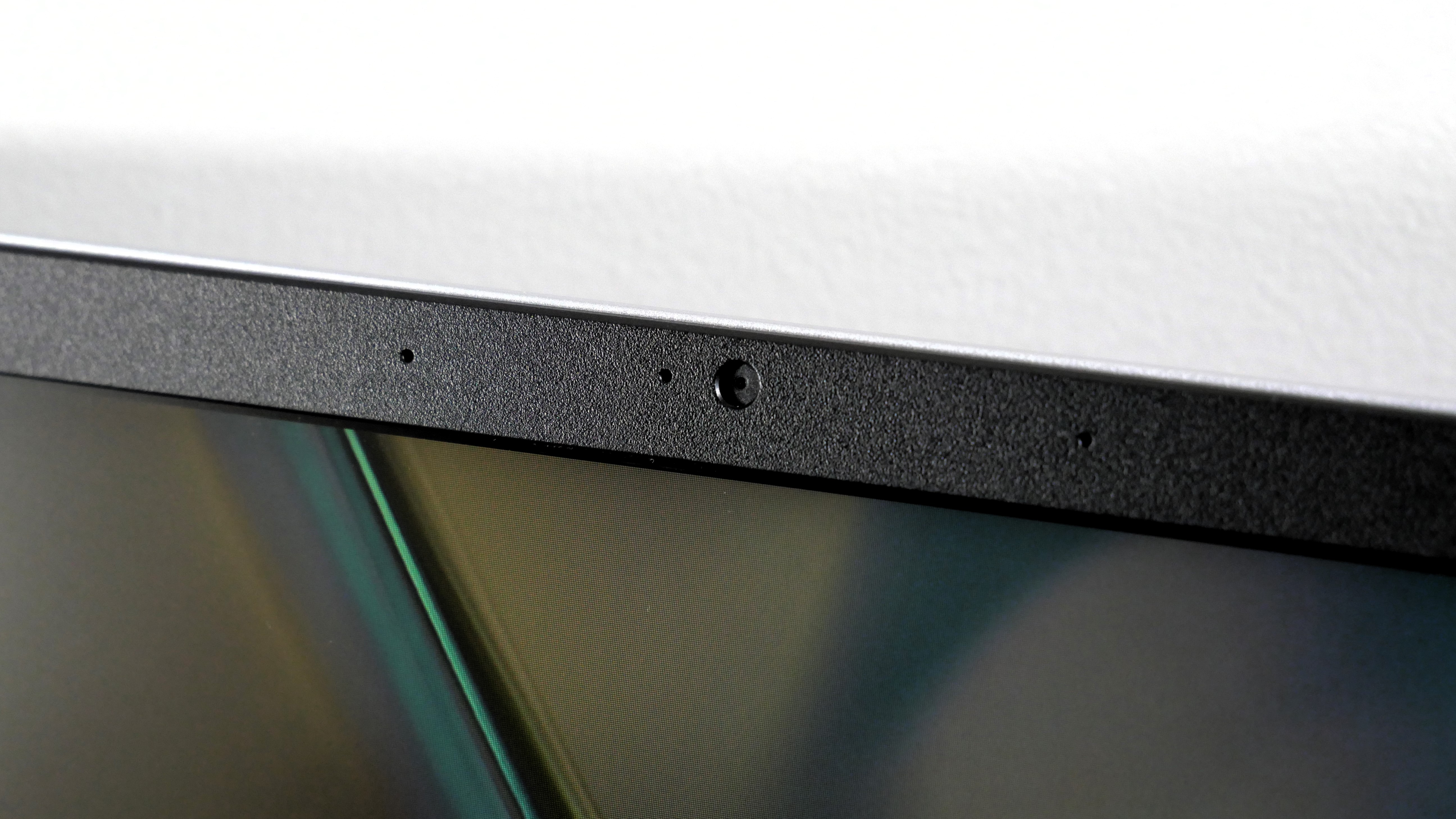 Acer Aspire 3 15 open against a white wall, highlighting the webcam.