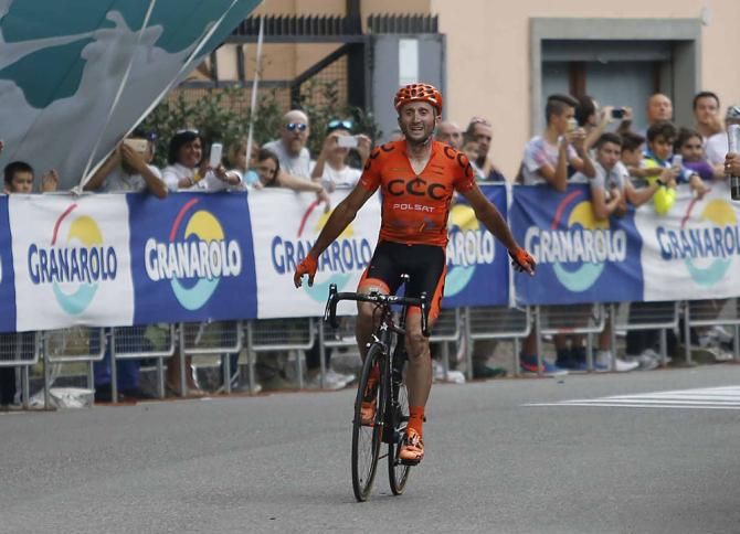 Davide Rebellin (CCC Polsat) jumps clear of a lead group on the last climb