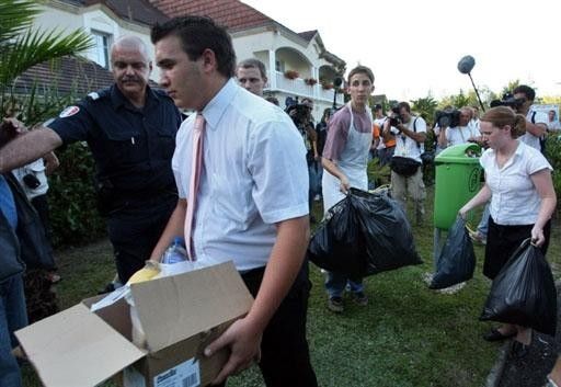 Staff from the Palmeraie Hotel are forced to bring rubbish back into the hotel by authorities.