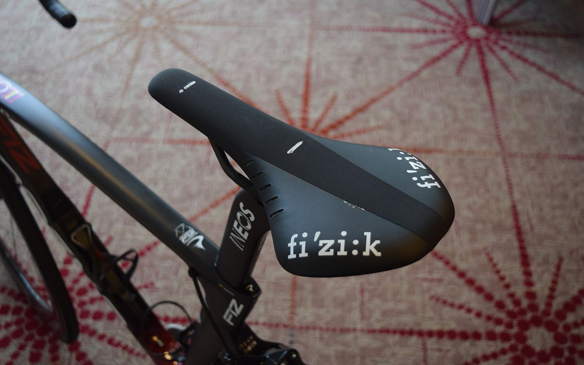Team Ineos mechanics mark their rider's saddles to ensure setup is correct