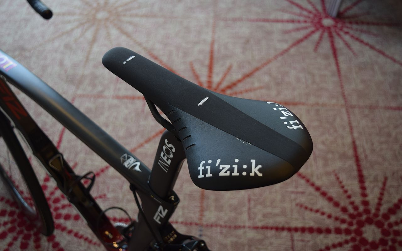 Team Ineos mechanics mark their rider's saddles to ensure setup is correct