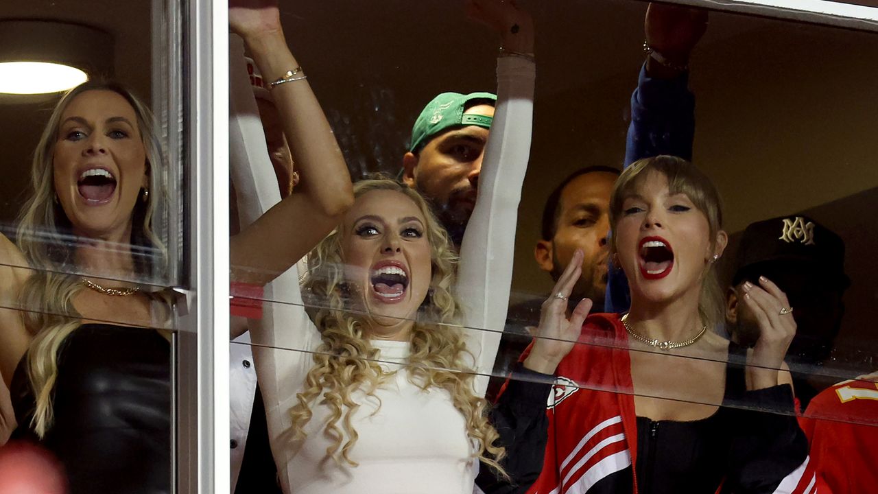 Lyndsay Bell, Brittany Mahomes and Taylor Swift celebrate a touchdown by the Kansas City Chiefs against the Denver Broncos during the second quarter at GEHA Field at Arrowhead Stadium on October 12, 2023 in Kansas City, Missouri. 