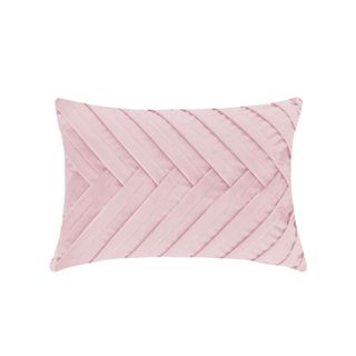 A pink pleated accent pillow