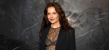Katie Holmes wore a sheer dress and underwear to Michael Kors Fall/Winter 2024 show at New York Fashion Week