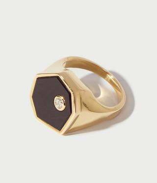 Onyx and gold signet ring with a diamond