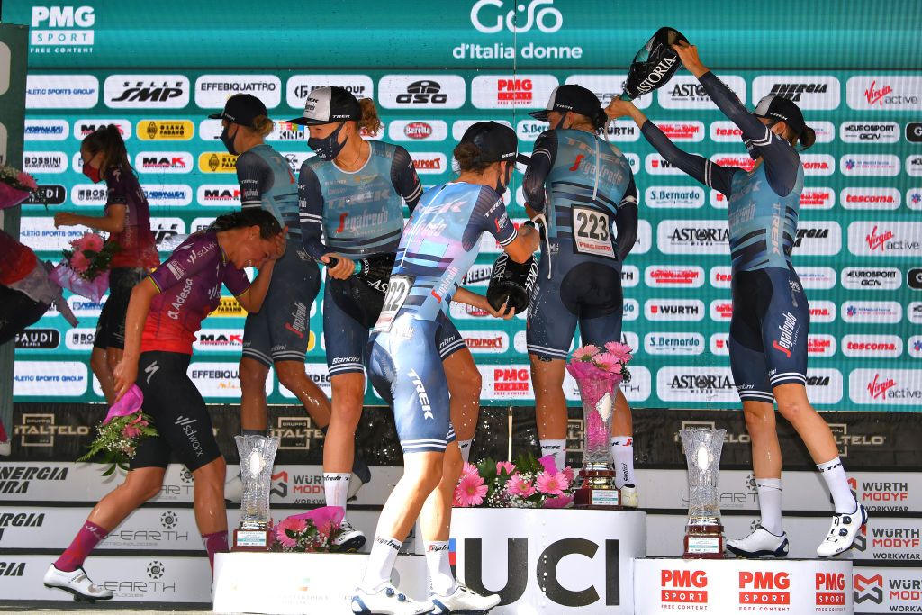 CUNEO ITALY JULY 02 Lucinda Brand of Netherlands Elisabeth DeignanArmitstead of United Kingdom Elisa Longo Borghini of Italy Ellen Van Dijk of Netherlands Tayler Wiles of United States Ruth Winder of United States and Team Trek Segafredo stage winners celebrates at podium during the 32nd Giro dItalia Internazionale Femminile 2021 Stage 1 a 267 Team Time Trial stage from Fossano to Cuneo 540m Champagne TTT GiroDonne UCIWWT on July 02 2021 in Cuneo Italy Photo by Luc ClaessenGetty Images