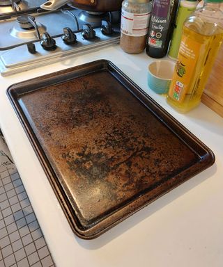 oven tray cleaning hack using mesh produce bag