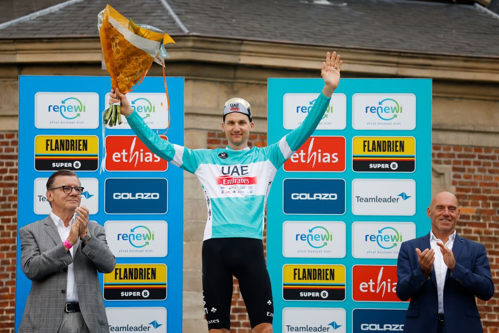 WINTERBERG GERMANY AUGUST 25 Tim Wellens of Belgium and UAE Team Emirates celebrates at podium as Green Points Jersey winner during the 19th Renewi Tour 2023 Stage 3 a 1712km stage from Aalter to Geraardsbergen UCIWT on August 25 2023 in Geraardsbergen Belgium Photo by Christian KasparBartkeGetty Images