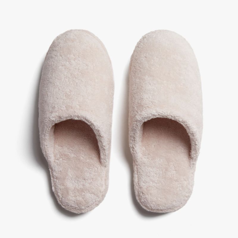 A pair of blush pink Parachute Classic Turkish Cotton Slippers for the best 40th birthday gifts.