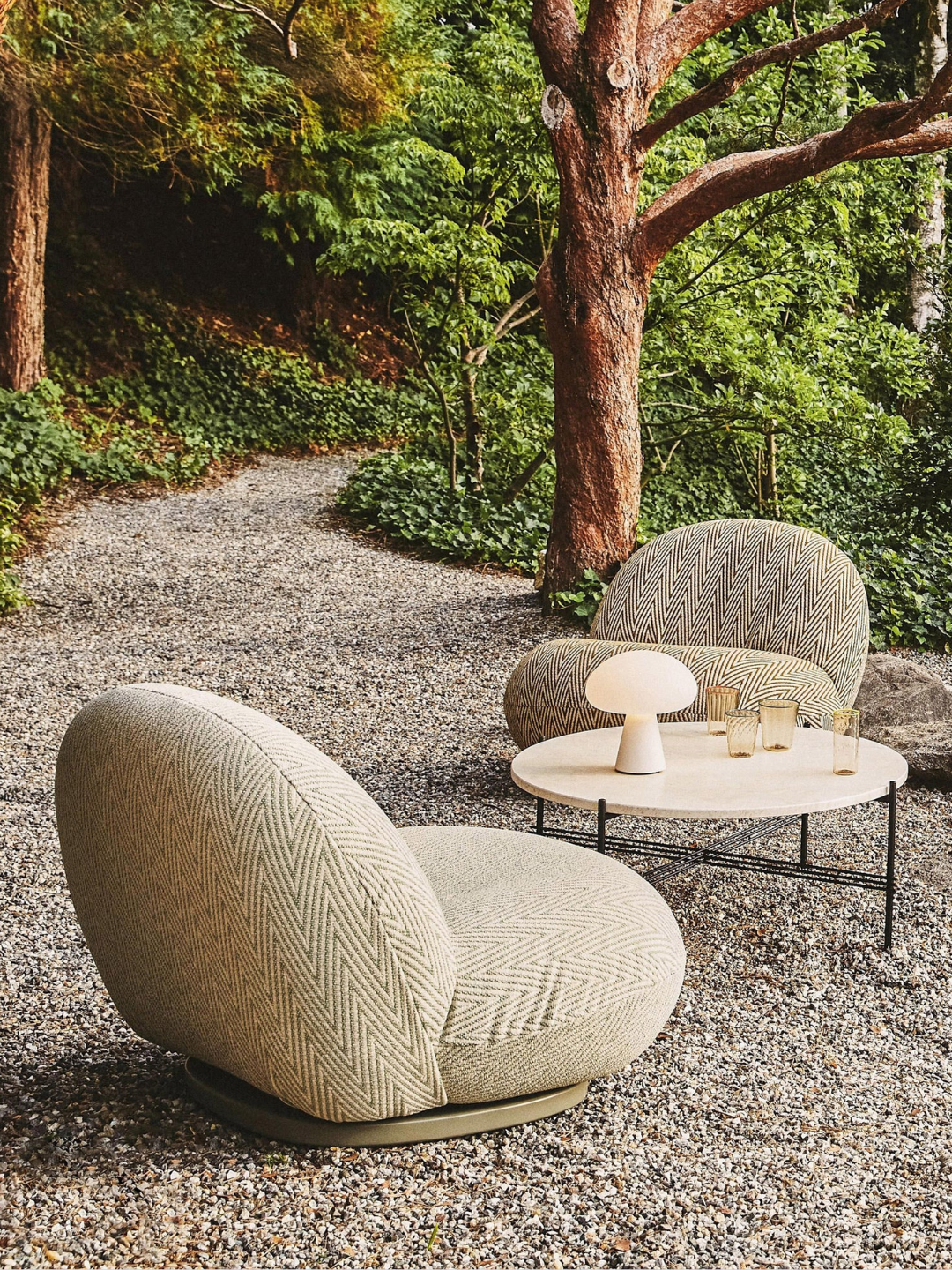 A swivel garden lounge chair from GUBI
