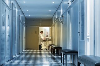 a doctor standing in a hospital