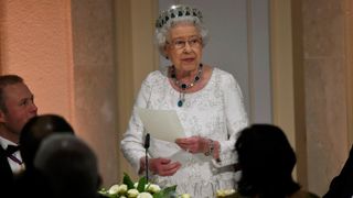 Queen Elizabeth II gives a speech as she attends a dinner at the Corinthia Palace Hotel in Attard during the Commonwealth Heads of Government Meeting (CHOGM) on November 27, 2015 near Valletta, Malta. Queen Elizabeth II, The Duke of Edinburgh, Prince Charles, Prince of Wales and Camilla, Duchess of Cornwall arrived today to attend the Commonwealth Heads of State Summit.